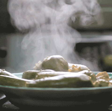 GIF of a steaming hot plate of food