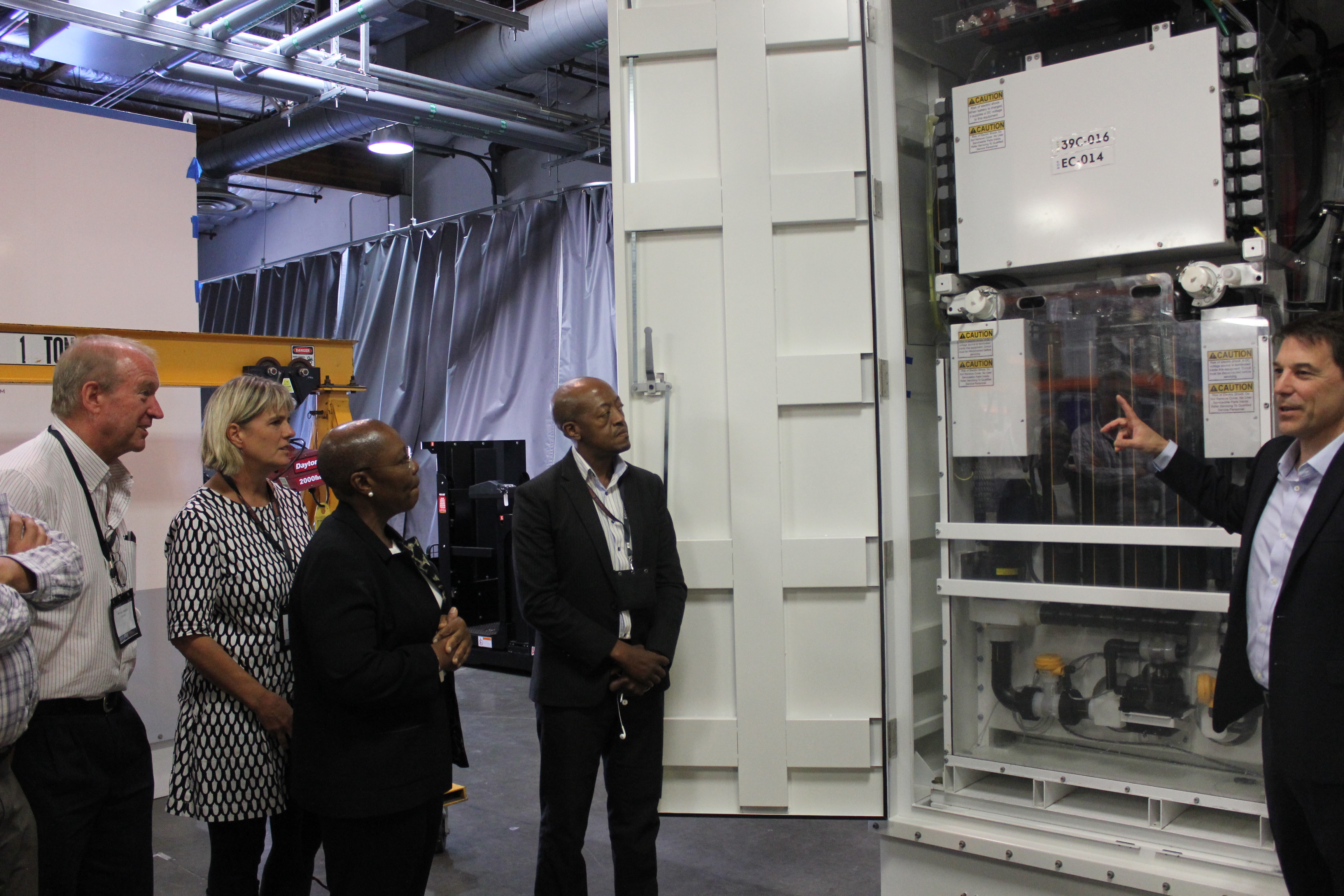 South African delegates learn about the Primus Power EnergyPod,  a zinc-flow battery technology designed for megawatt-scale energy storage, at the Primus Power facilities  in Hayward, California. 