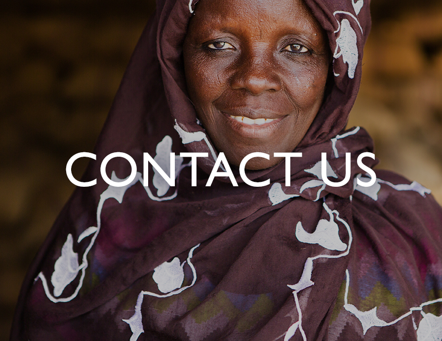 Contact Us - A close-up photo of a smiling woman