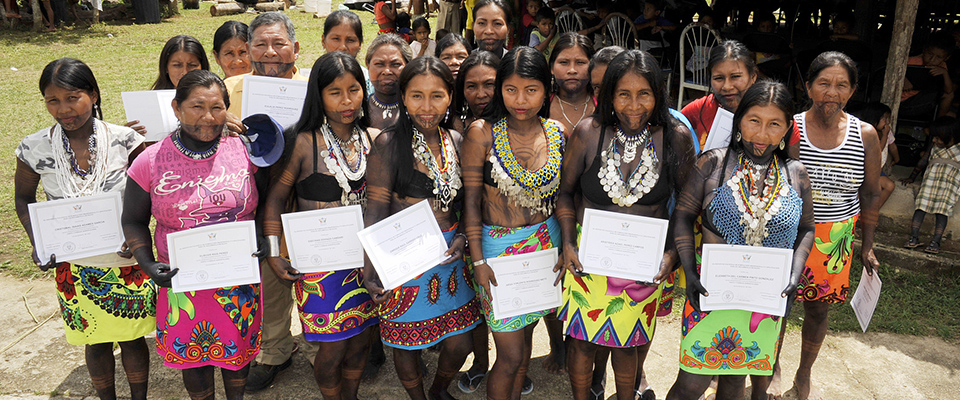 Women from Panama display certificates