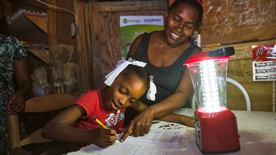 Phaima, Nancy Goldman’s daughter, can now study in the evening thanks to a solar powered lamp.