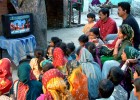 Reading, a by-product of entertainment: community viewing of Bollywood film songs with same-language subtitling in Gulbai Tekra 