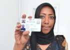 Naima, Mombasa’s first medically assisted therapy (MAT) patient, shows her MAT ID card.