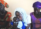 New mothers listen intently to guidance from the community health team in Koulouck Mbada about caring for their newborn infants.