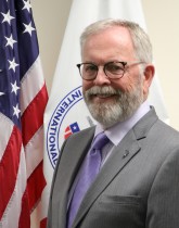 Keith E. Simmons, Acting Mission Director