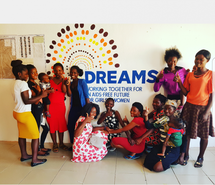 DREAMS girls pose in front of their DREAMS Center