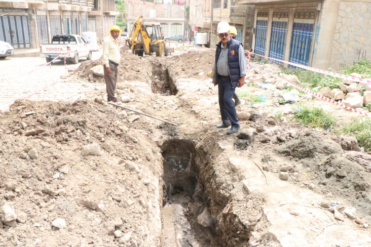 Excavating sewage lines for rehabilitation.