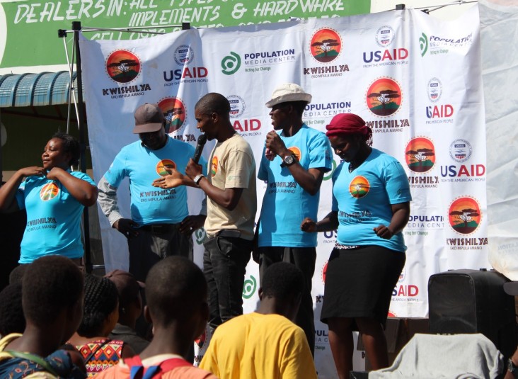 Members of the CHRP team perform a  live show to address family planning, nutrition, gender-based violence, and HIV.