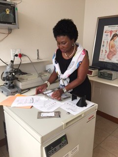 Ms. Rachel Mokhondo (Research Assistant, University of Pretoria & MRC) works to develop the Red Congo Dot Test, an easy and effective way to detect early cases of pre-eclampsia