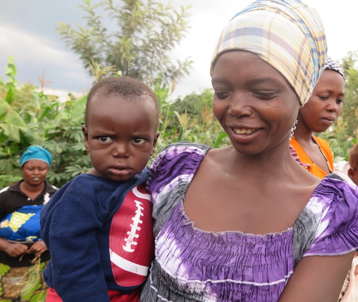 Nyirahabimana, a rural mother in Rwanda, holds her son Emmanuel