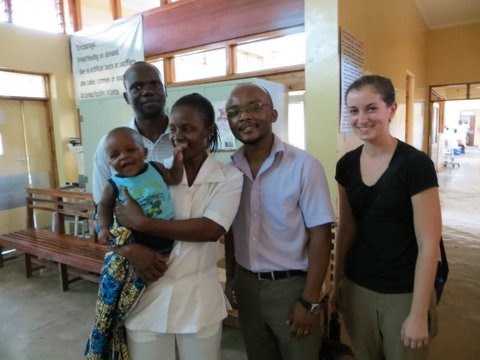 Rice student Jocelyn Brown meets baby Chisomo in the Machinga District Hospital. 