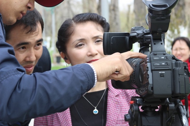 Journalists practicing during the cross-border exchange program 