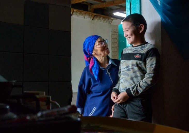 Avaz and his mother are happy that they finally received a birth certificate with the help of a free legal aid center. USAID help to open 10 of such centers across Kyrgyzstan.