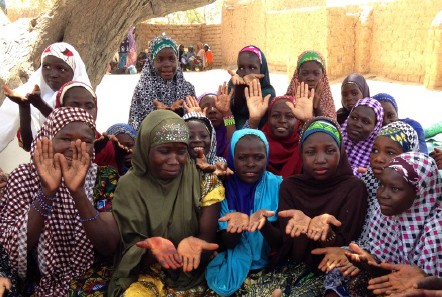 Nigerien girls discuss hand washing in a community Safe Space club