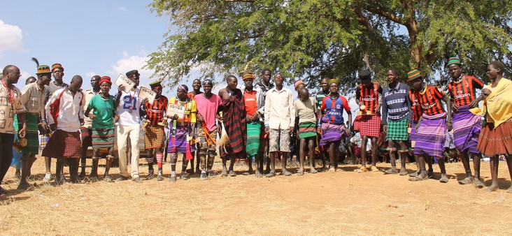 The former warriors and new graduates celebrating with the famous Karamojong Jump