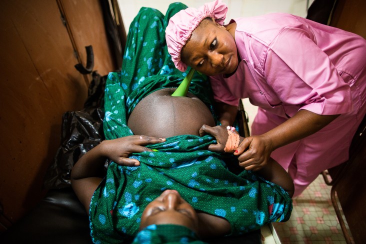 A Malian midwife provides lifesaving maternal care to prevent complications such as obstetric fistula, a debilitating childbirth injury that can occur during prolonged or obstructed labor.