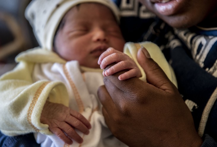 lena Tantely Rasoarilala, 21, is holding her one-day-old baby girl