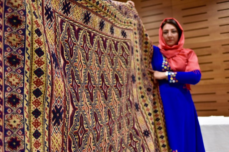 An Afghan businesswomen showcase her products at a fair in Kabul.