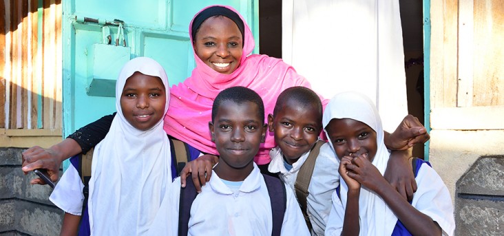 Zainab Mohamed and her children Nimo, Makbul, Adam and Muslima outside their house in Bula Pesa, Isiolo town before they leave for classes at Uhuru Primary School. Muslima is a class two pupil who uses Tusome books which has enabled her attain advanced reading and writing skills compared to her older siblings