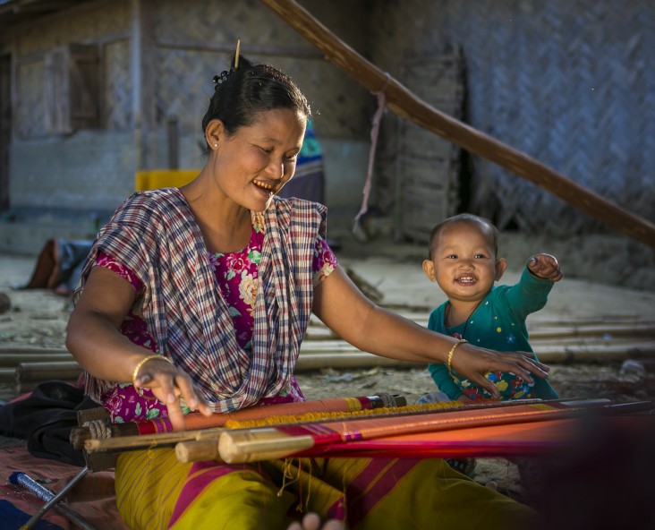 USAID-funded training in weaving helped Chiro Debi supplement her family’s income from farming. 