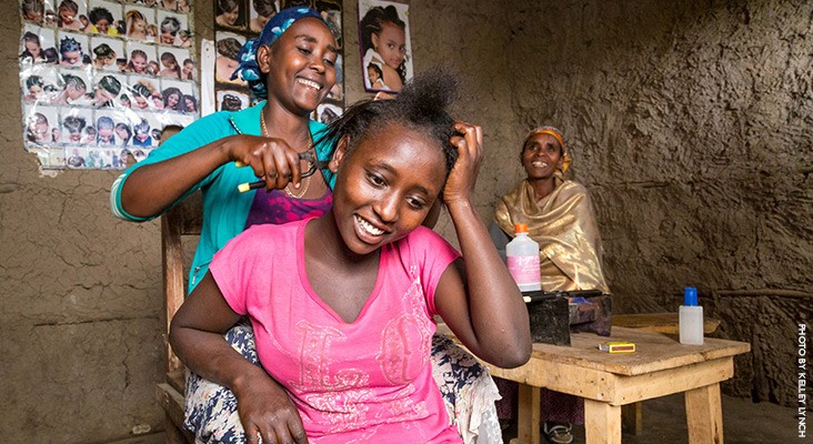 Image of Ethiopian woman salon owner and client
