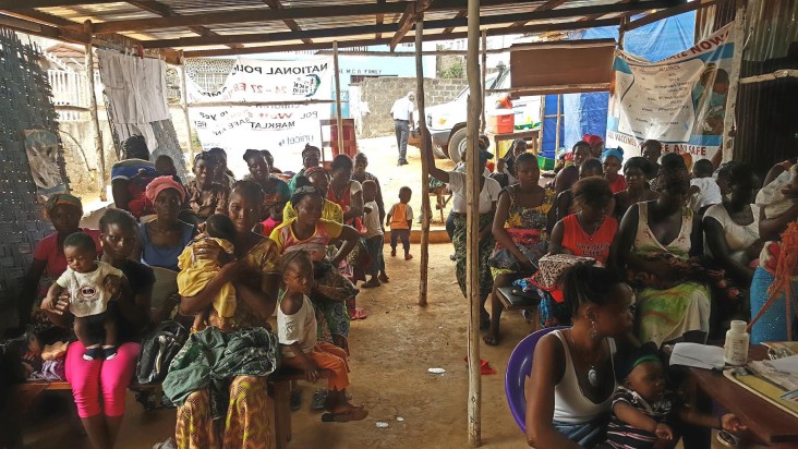 Women wait to be registered and see Nurse Betty and her staff at the maternal and child health post in the Malama suburb of Freetown, Sierra Leone.