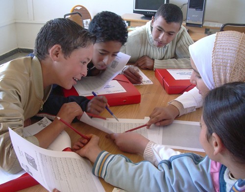 Image of young Morrocan children working together in a classroom