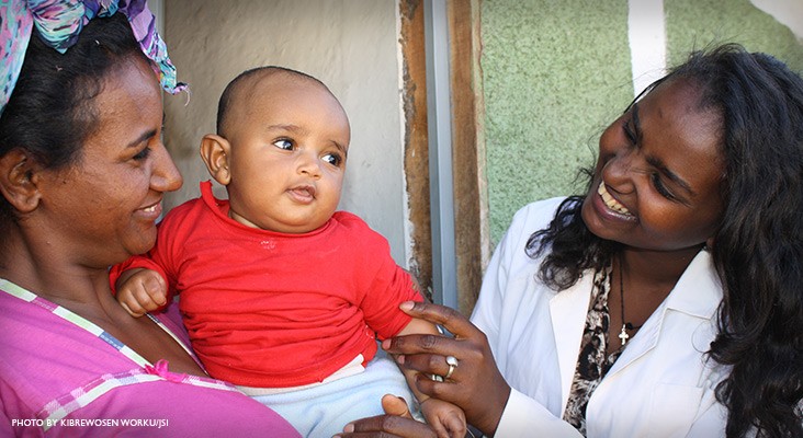Image of Ethiopia urban health worker checking on mother and baby