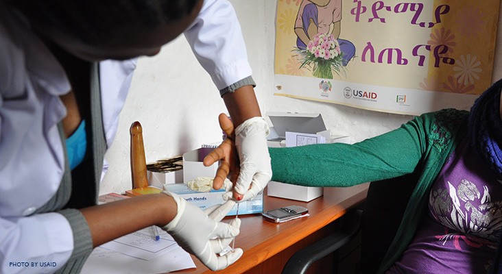 Image of health worker conducting HIV test in Ethiopia