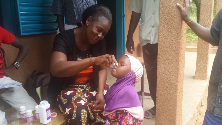 Global Health Girl Receives NTD Medicine in Burkina Faso
