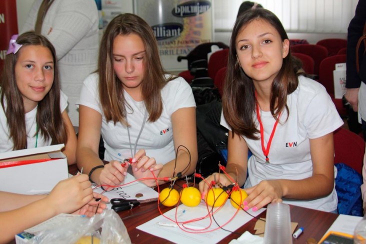 Girls learn how to create electricity from lemons in a hands-on experiment at EVN Macedonia’s inaugural Bring Your Daughter to W