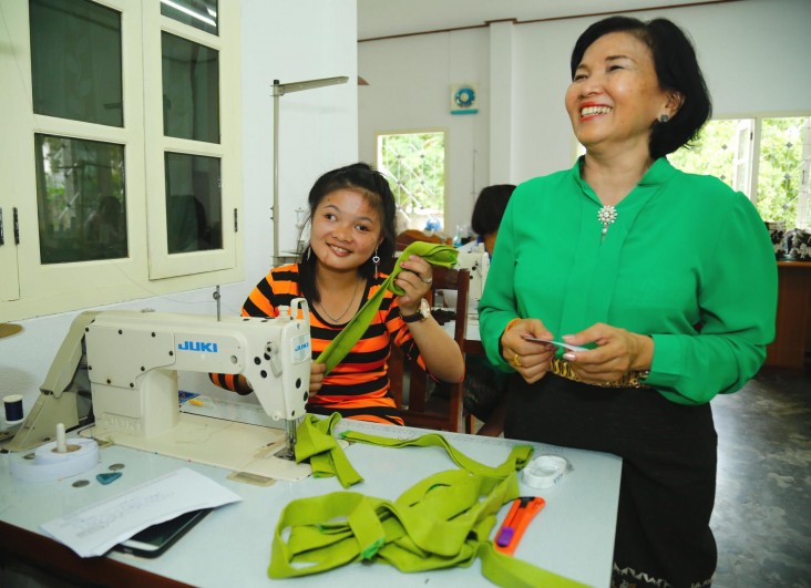 Chan Vong Sengchanlatsamy learns to sew at the Lao Disabled Women’s Development Center.
