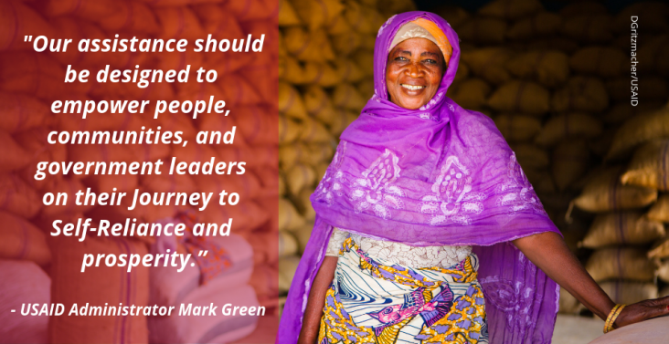 Image of a woman with quote "our assistance should be designed to empower people, communities, and government leaders on their Journey to Self-Reliance and prosperity - USAID Administrator Mark Green"