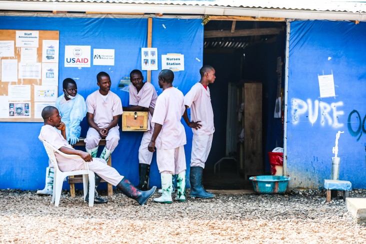Aid workers rest at the Bong County Ebola Treatment Unit. 