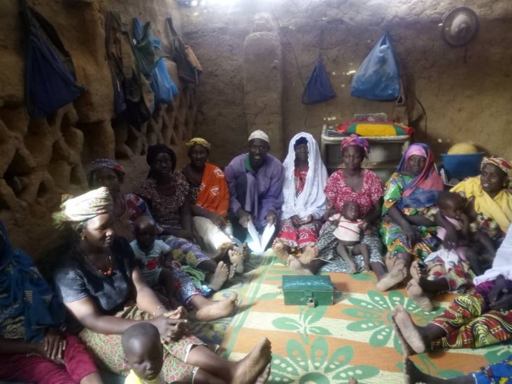 Mamadou Tah Ongoiba with VSLA group members