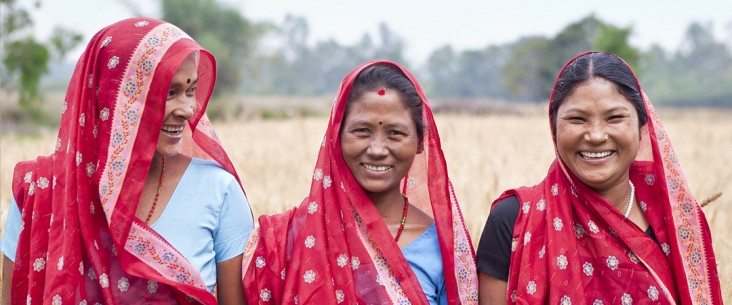 Close up of three women smiling in a field Close up of three women smiling in a field