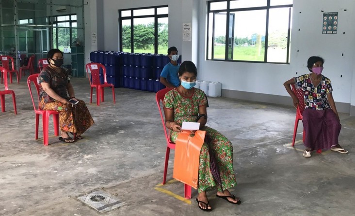 Health workers and clients from the clinics follow the social distancing guidelines, wear PPE, and provide handwashing facilities to prevent the spread of COVID-19.