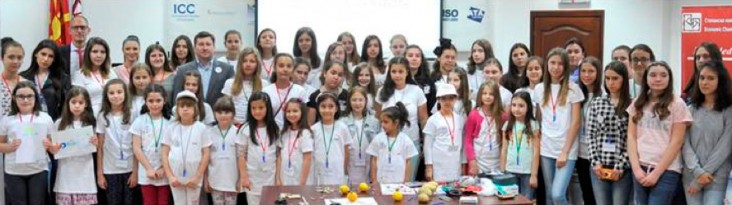 Girls and their parents pose for a group photo at EVN Macedonia's Bring Your Daughter to Work Day in Skopje