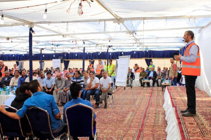 Um Al Jamal community members participating in a community-wide meeting in the Governorate of Mafraq.