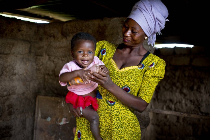 Rahama, 30, plays with her 9-month-old daughter, Maradiatu, inside their home in Sijri Veng Veng Village, Ghana.