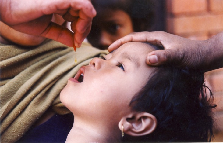 A child receives oral medication
