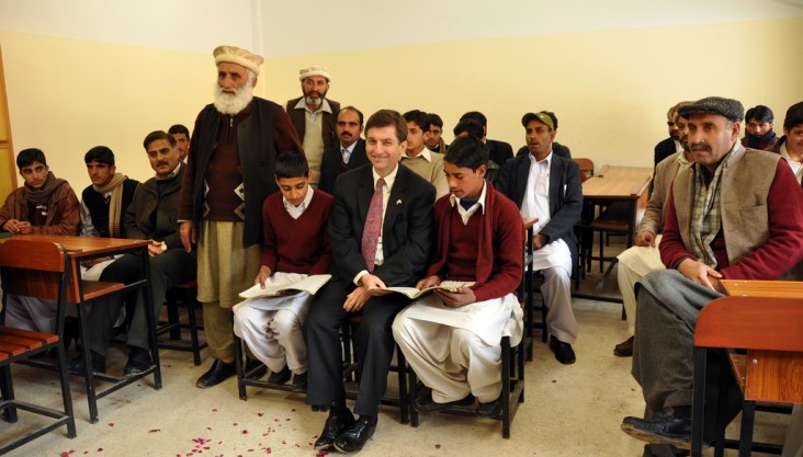 USAID/Pakistan Mission Director Andrew Sisson with students in a classroom at the Government Boys’ Higher Secondary School Rera.