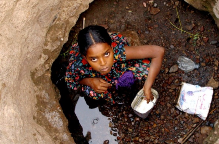 Young girl collecting water in Sagllou prior to USAID WASH project. USAID in Djibouti
