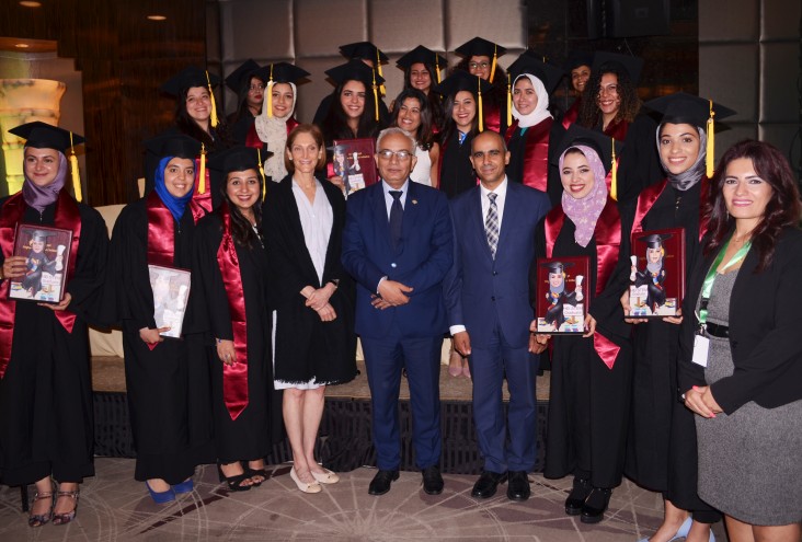 USAID/Egypt Mission Director Sherry F. Carlin with U.S.-Egypt Higher Education Initiative STEM scholarship recipients who recently graduated from universities in the United States.