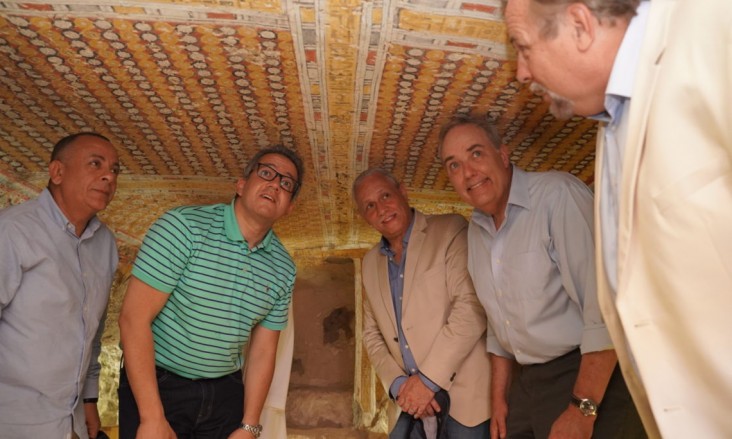 U.S. Embassy Chargé d’Affaires Thomas Goldberger, Minister of Antiquities Dr. Khaled El Anany, and Secretary General of the Supreme Council of Antiquities Dr. Mostafa Waziri visit a nobleman's tomb at Dra Abu El Naga that was conserved with USAID assistance.