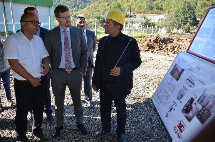 Deputy Chief of Mission learns about the construction of a honey processing facility in Lerik district.