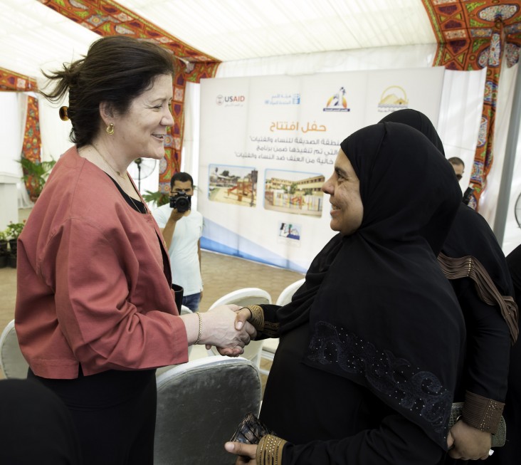 Deputy Chief of Mission Dorothy Shea meets a beneficiary at the Imbaba community hub for women and girls