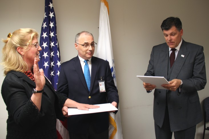 Woman swearing in as USAID/Albania new Country Representative.