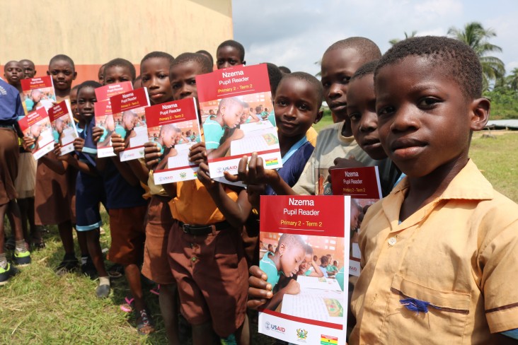 P2 Pupils of Sowodadzen Primary School in the Jomoro District of the Western Region displaying the materials the school received.