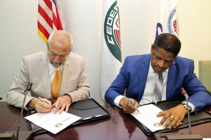 USAID/WA Mission Director, Alex Deprez and ECOWAS President sign agreement